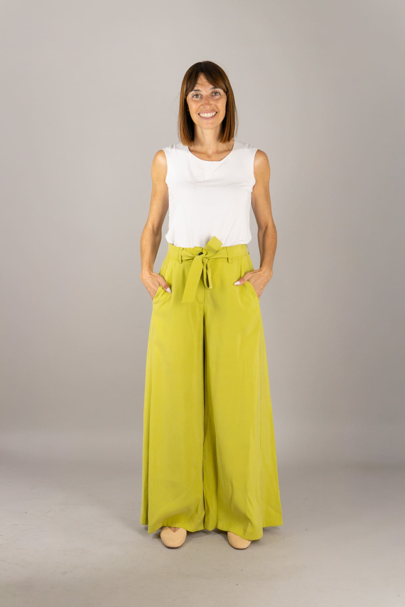 pantalone palazzo tulia lime dettagli di capogrio pantalone palazzo tulia lime dettagli di capogrio